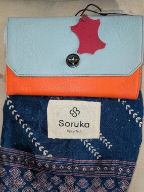 Soruka leather blue and orange crossbody clutch bag NWT